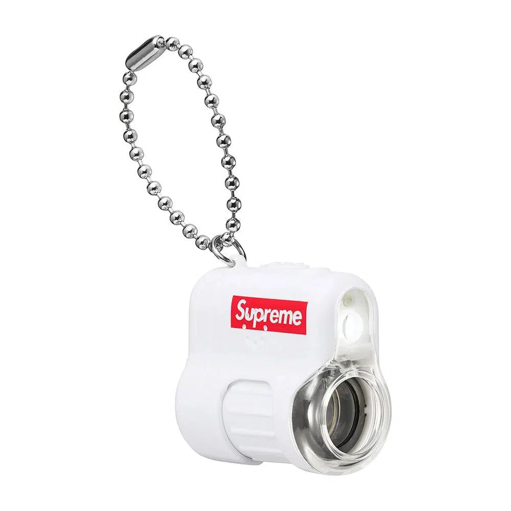 SUPREME®/RAYMAY POCKET MICROSCOPE KEYCHAIN | Waves Never Die | Supreme | ACCESSORIES